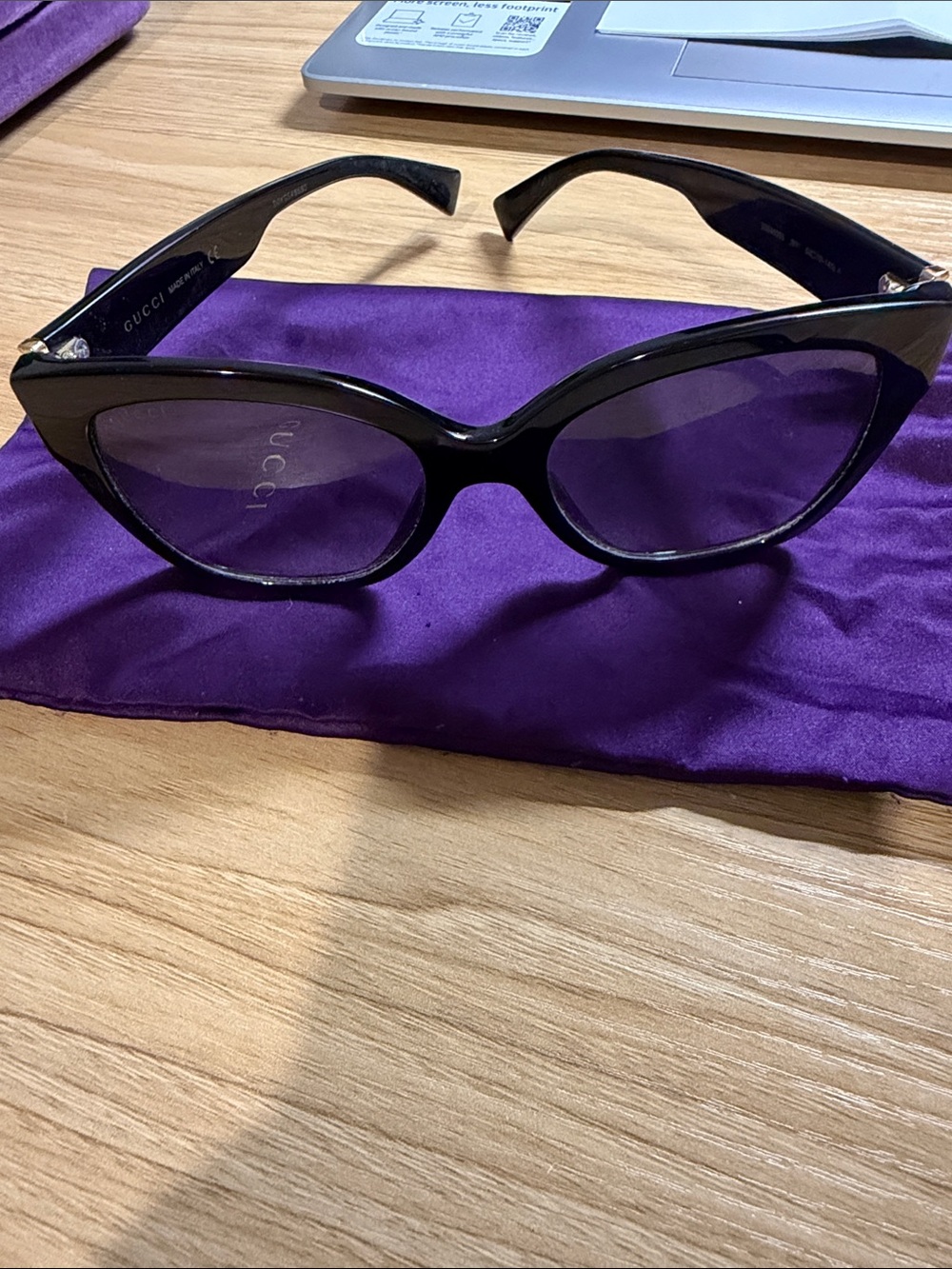 Gucci Black Cat-Eye Sunglasses with Subtle Gold Accents